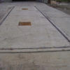 Pit mounted composite truck scale